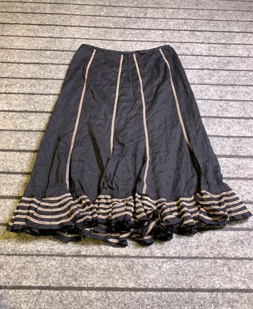Black Skirt with Striped Ruffle Hem