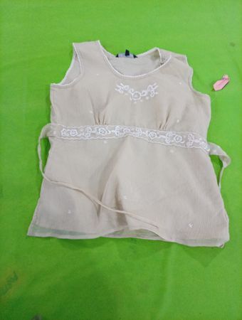 Women's Cream Colored Sleeveless Top