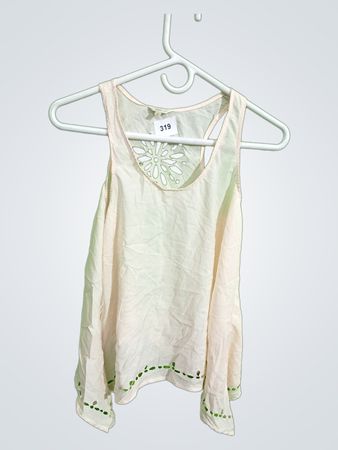 White Blouse with Green Accents