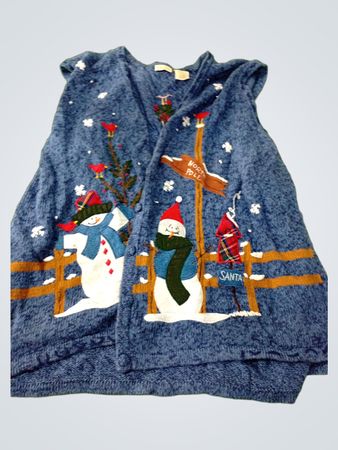 Blue knitted sleeveless sweater with snowman and Santa Claus design