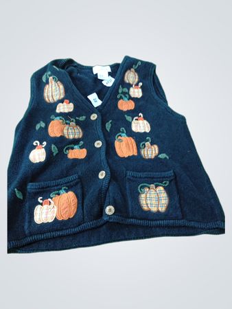Black vest with pumpkin embroidery