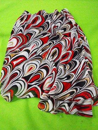 Scarf with Red, Black, White, and Gold Swirl Pattern