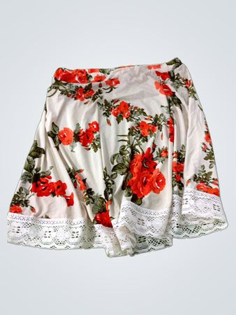 White skirt with red floral print and lace trim