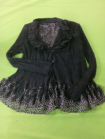 Black pleated blouse with white polka dot trim