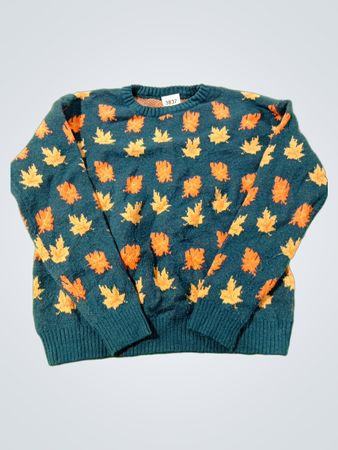 Türkisfarbener Pullover mit orangefarbenem und gelbem Blattmuster