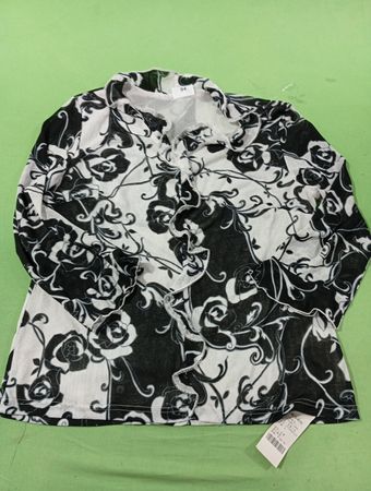 Durchsichtiges schwarzes und weißes Blumenmuster Langarmoberteil mit Rüschen