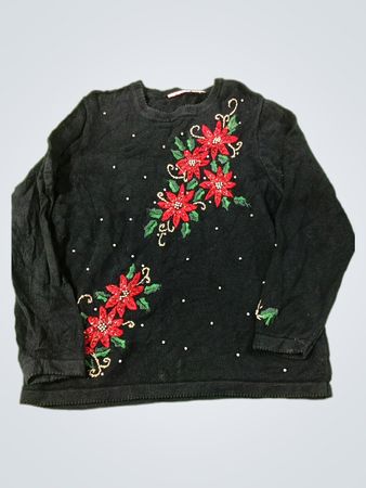 Schwarzer Pullover mit gestickten Weihnachtssternen