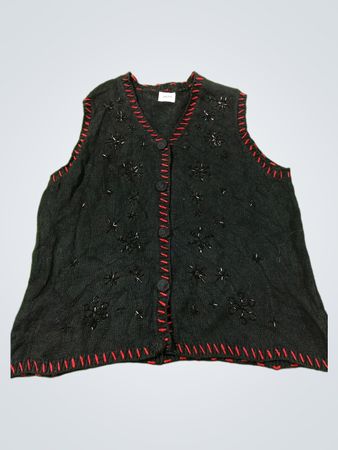 Schwarze Weste mit Perlenbesatz und roter Naht