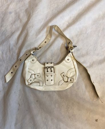 White patent leather shoulder bag with buckle detail