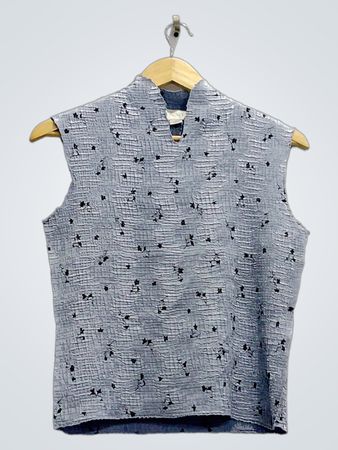 Gray Sleeveless Top with Black Floral Pattern