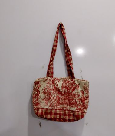 Tote bag with red and white toile pattern and plaid trim