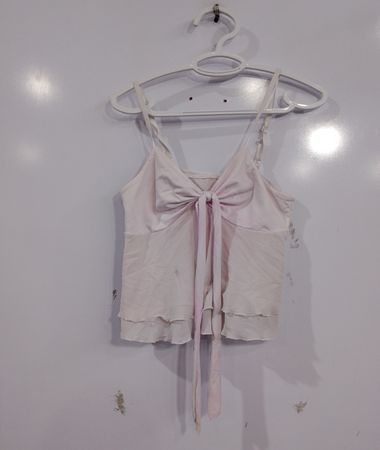 Camisole rose avec nœud et volants