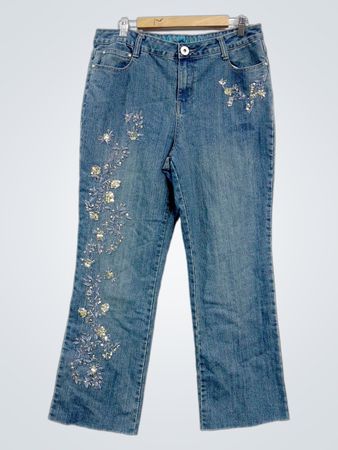 Blaue, verziert ausgestellte Jeans