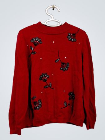 Roter Pullover mit Blumenapplikationen und Pailletten