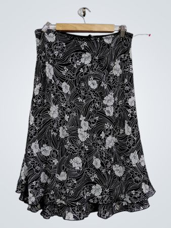 Skirtology schwarzer Rock mit Blumenmuster