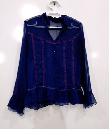 Blusa Azul de Babados Transparente