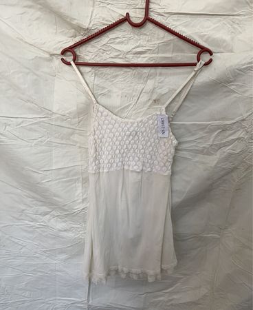 White Sleeveless Top