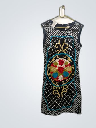 Black Sleeveless Dress with White Geometric Pattern and Floral Design