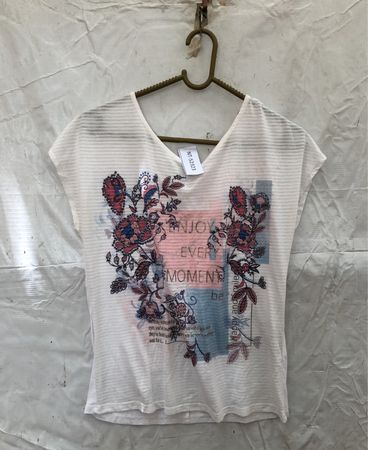 White Women's Top with Floral Design