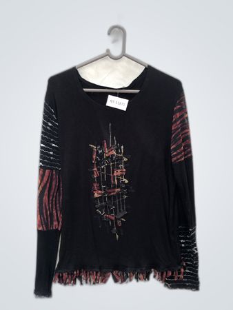 Black Long-Sleeve Top with Red and Black Striped Sleeves and Fringed Hem