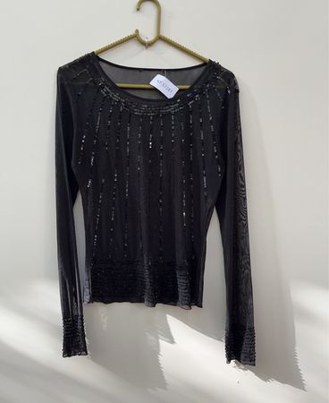 Schwarzes Pailletten-transparentes Langarmtop