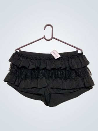 Schwarze Rüschenshorts mit Spitzenbesatz