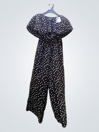 Schwarzer und weißer Pünktchen-Overall