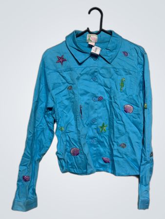 Blau bestickte Schwimmweste mit Meereslebewesen