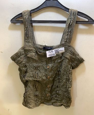 Reserviertes Spitzentop