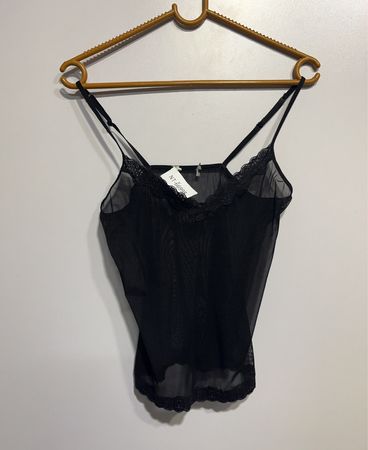 Schwarze transparente Spitzenbesatz-Top