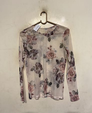 Durchsichtige florale Langarmbluse