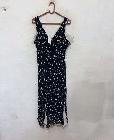 Schwarz gepunktetes Midi-Kleid
