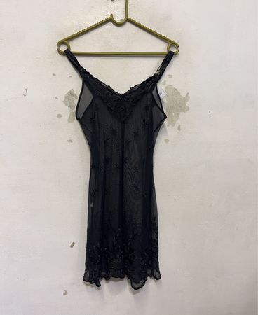 Schwarzes durchsichtiges Spitzen-Unterkleid