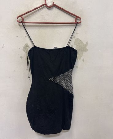 Schwarzes Trägershirt mit Paillettenbesatz