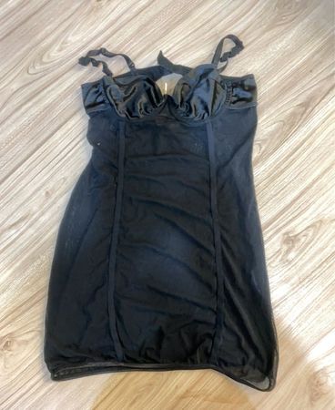 Schwarzes Netz-Babydoll-Dessous