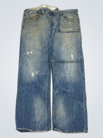 Akoo Jean en denim déchiré