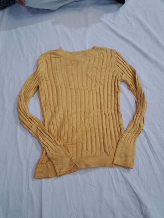 Un pull en tricot A New Day