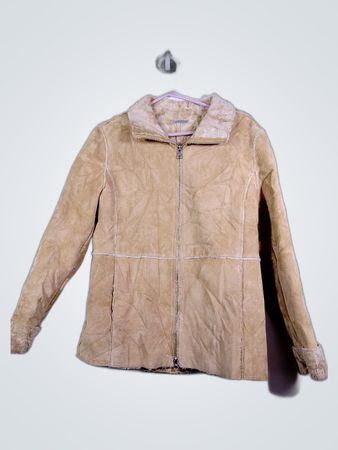 Giacca in finta pelliccia beige foderata