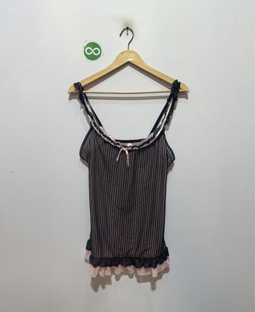 Sophie B. Débardeur transparent à rayures noires avec bord rose