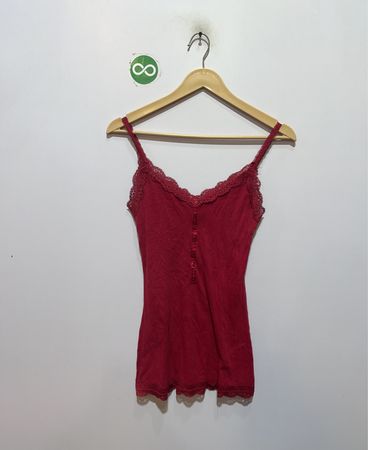 Red camisole with lace trim and buttons