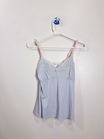 Gray and white patterned camisole with pink trim and bow