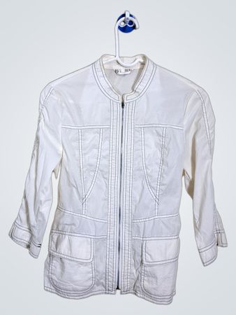 White jacket with dark stitching