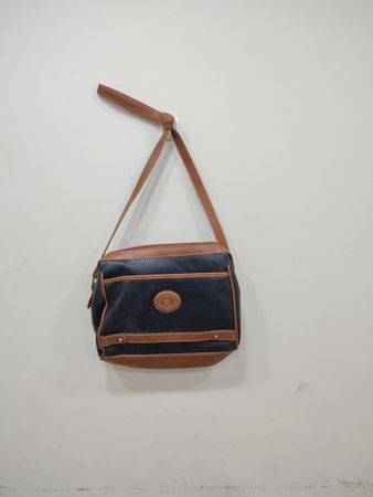 Black and brown leather crossbody bag