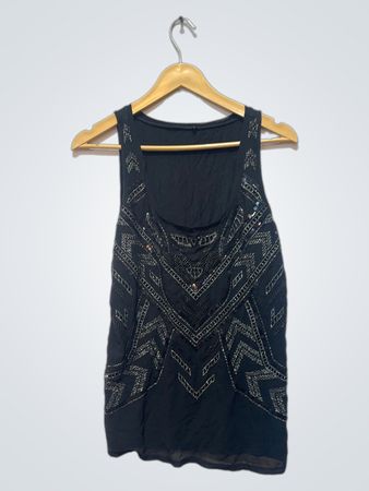 Black sleeveless top with embellishments