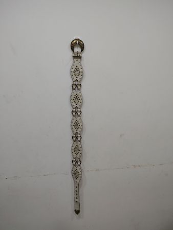 White studded belt with gold buckle
