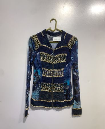 Blue and gold patterned zip-up sweater