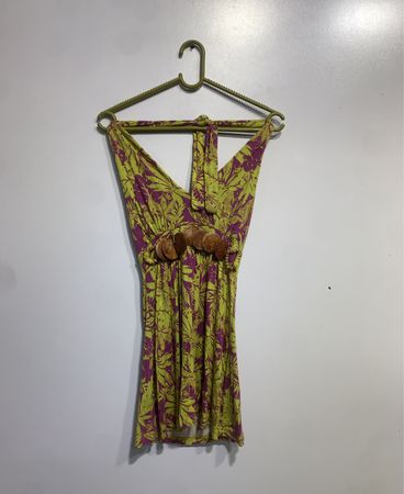 Green and purple floral print halter top with wooden accents