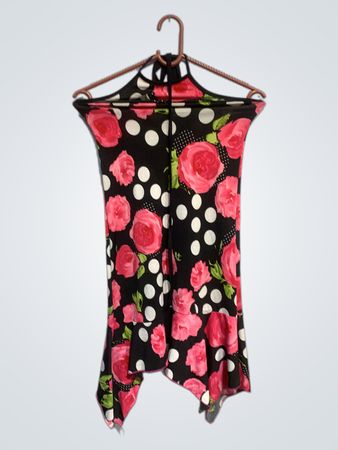 Black sleeveless top with pink roses and white polka dots