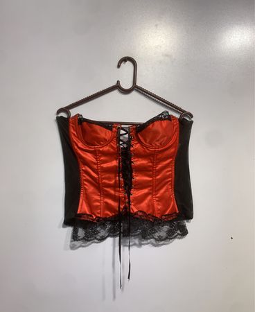 Oranges und schwarzes Korsett mit Spitzenbesatz