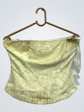 Top en corset jaune clair avec des sequins